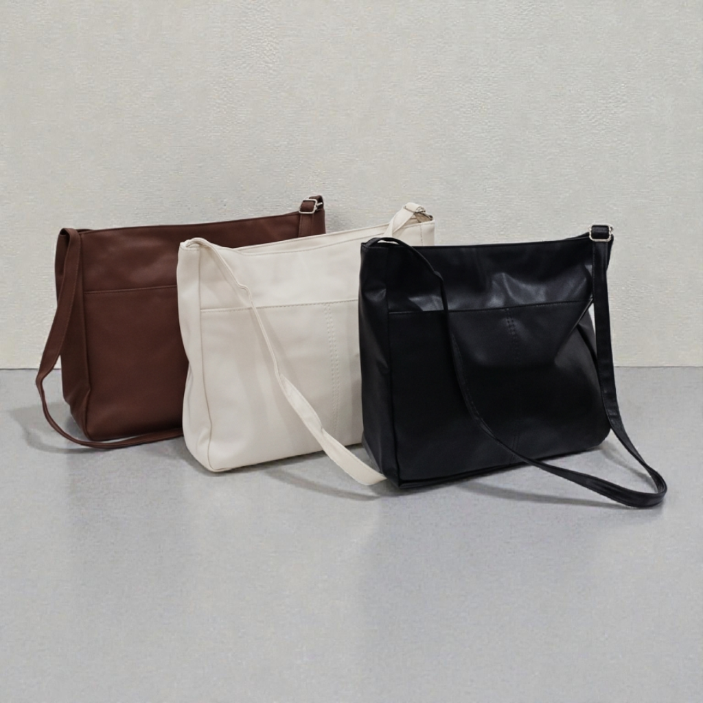 شنطة توت جلد عمليّة