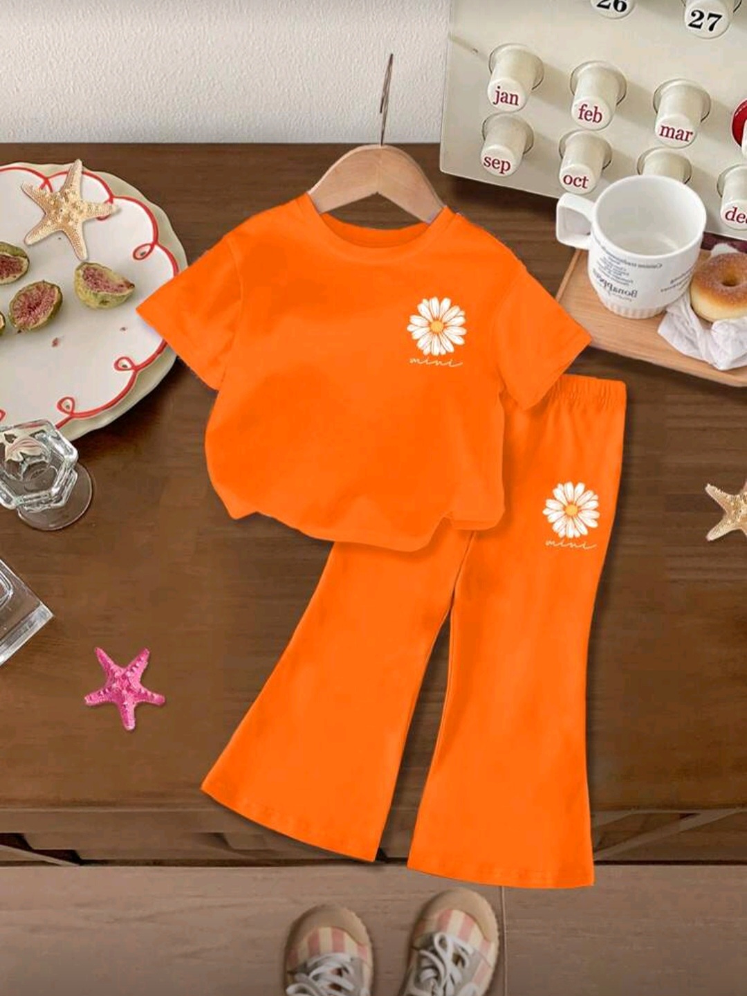 طقم لبسة لللبنات باللون البرتقالي